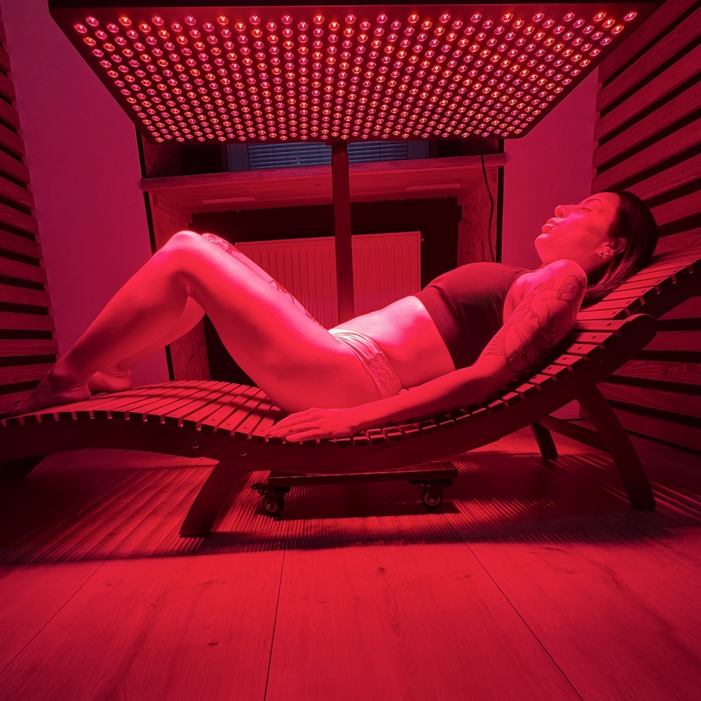 Client receiving red and infrared light therapy at Healing Club